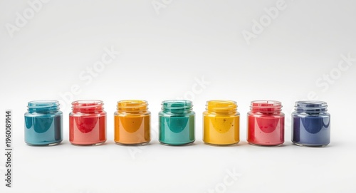 Row of watercolor paint jar...