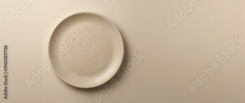 Isolated smooth beige plate...