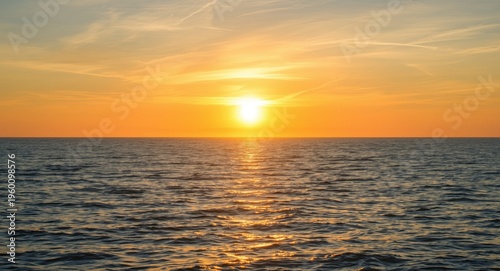 Shimmering sea under a radi...