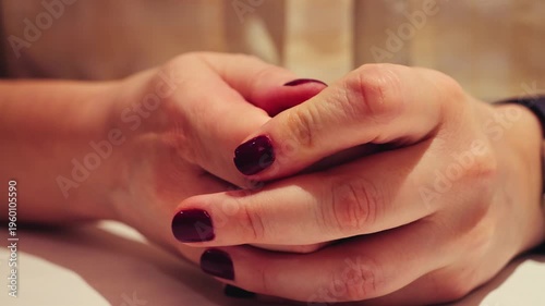 A restless, anxious woman, close-up of her hands rubbing nervously. High quality 4k footage