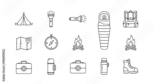 Camping gear and equipment laid outdoors