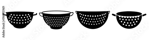 Set of four black and white polka dot colanders kitchen utensils strainers cooking prep tools isolated on white background