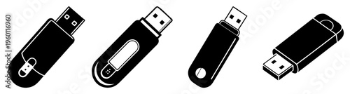 Set of four sleek black USB flash drives isolated on white background for data storage and technology concept
