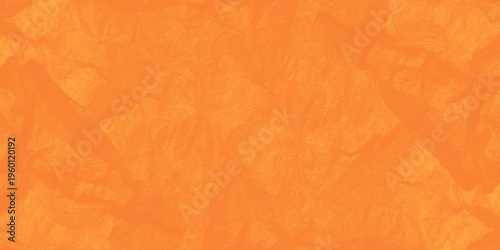 Vibrant orange crumpled paper texture background with realistic creases and shadows for creative design work