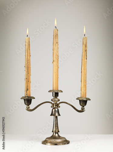 Fotografia Antique Candle Holder with burning candles