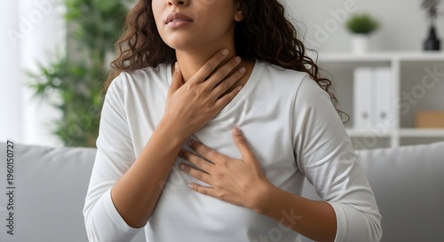Young Woman Experiencing Sore Throat and Chest Discomfort