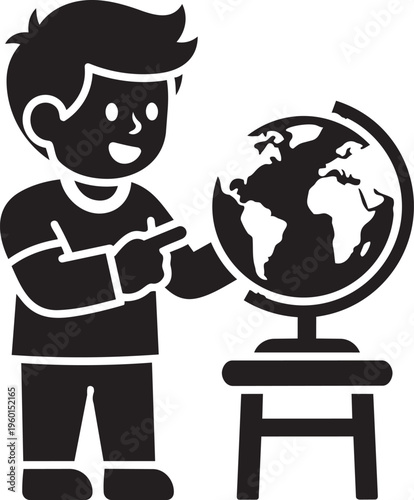 Smiling boy points to a detailed terrestrial globe resting on a small wooden.