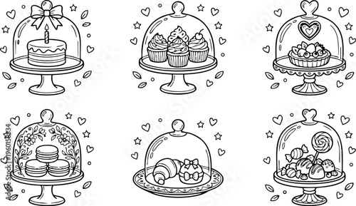 Assorted cakes cookies and candies under glass cloches