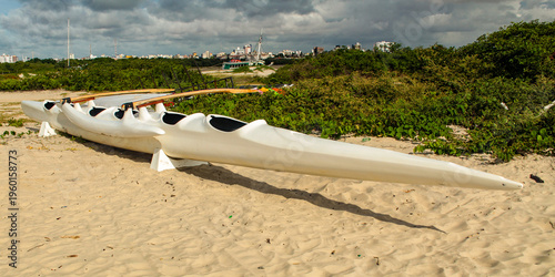 Hawaiian or Polynesian canoe, stranded on the sand of Ponta d'Areia beach, in São Luís, MA, Brazil.