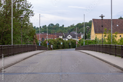 Bild auf Leinwand Road bridge leading into small town of Neudenau, Germany with houses and country