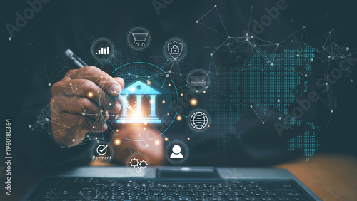 Digital banking and fintech concept. Human using pen pointing virtual bank icon and connected financial services interface. Online payment, security, global transactions and smart finance technology.
