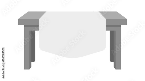 A simple table with a clean, white cloth draped across it, presented in a minimalist style.