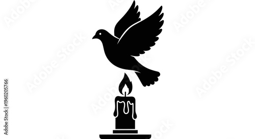 Black silhouette bird flying over candle.