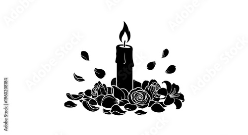 Black candle with burning flame surrounded petals.