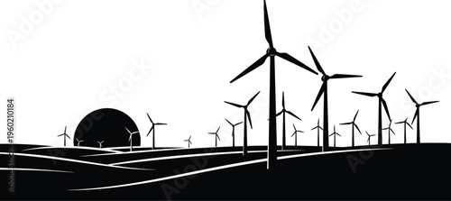 Sunset over wind turbines and rural landscape with silhouette