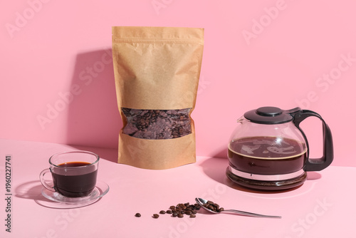 Cup of coffee with pot, bag...