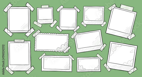 Minimal white photo frames with tape on soft green background composition