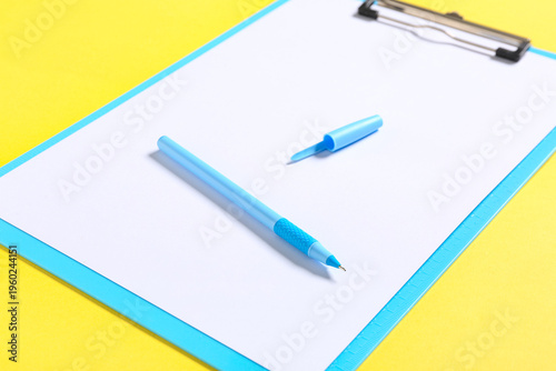 Clipboard with paper sheet,...
