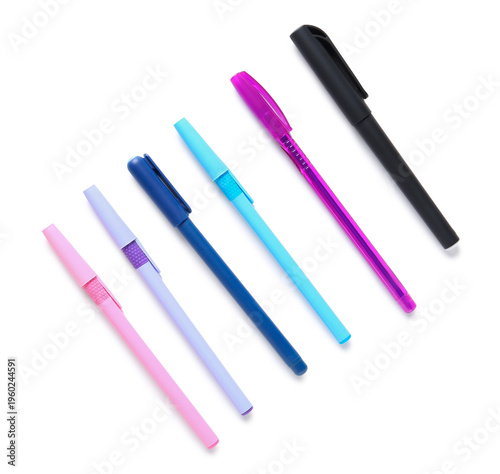 Different pens on white bac...
