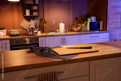 Wooden cutting board with k...
