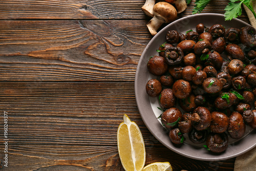 Bowl with tasty fried mushr...