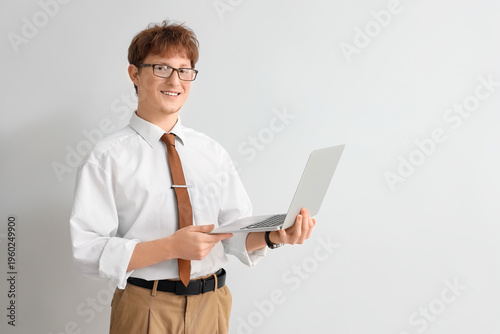 Young redhead businessman w...