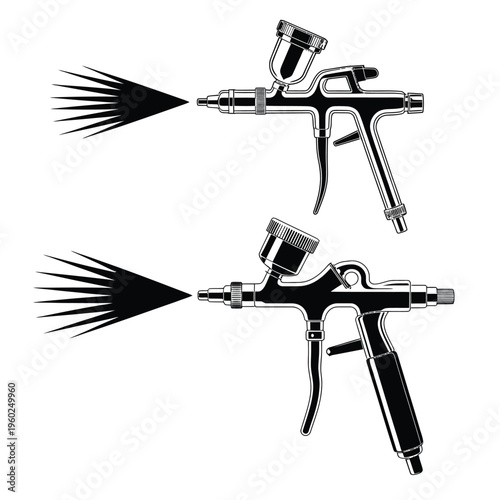 Two airbrushes spraying showcasing their design and functionality