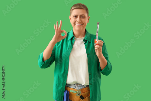 Young woman with tape measu...