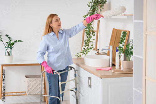 Mature woman with walker an...