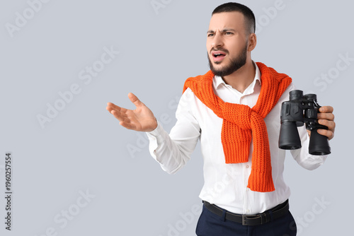 Shocked businessman with bi...