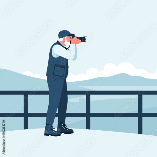 Elderly Photographer Capturing Scenic Mountain Vista During Outdoor Adventure