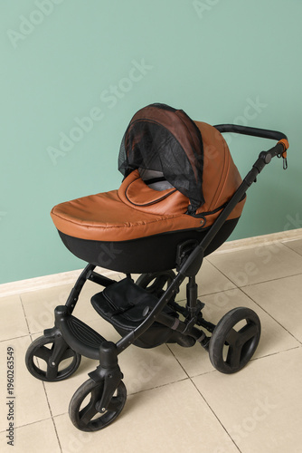 Modern baby stroller near b...