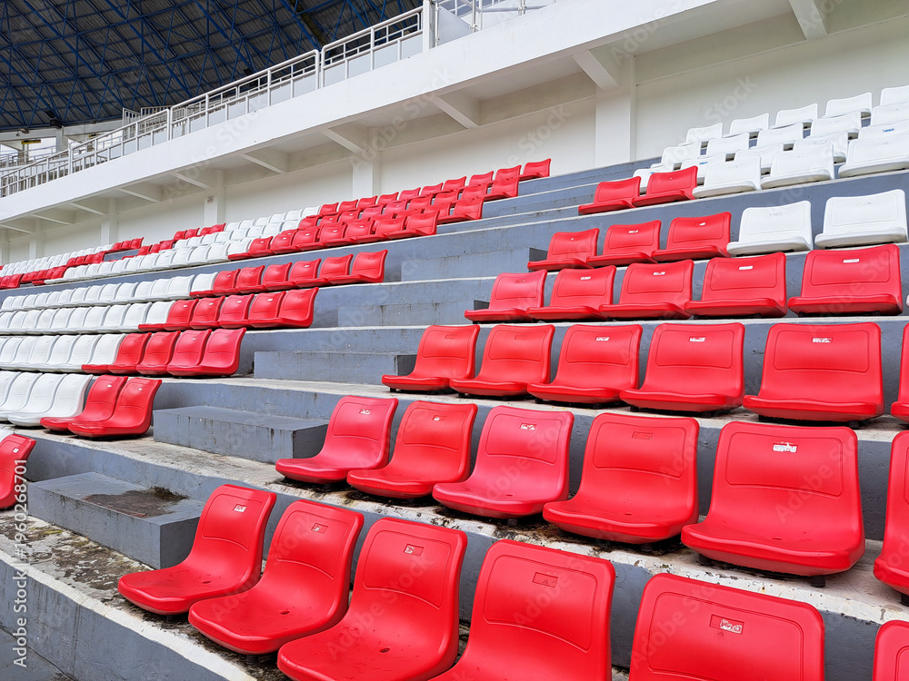 Fototapeta premium Red and white football stadium benches
