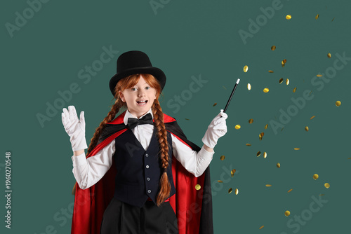 Young magician showing magi...
