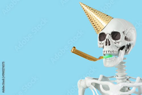 Human skeleton in party hat...