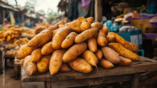 Pile of Fresh Sweet Potatoes at a Vibrant Market