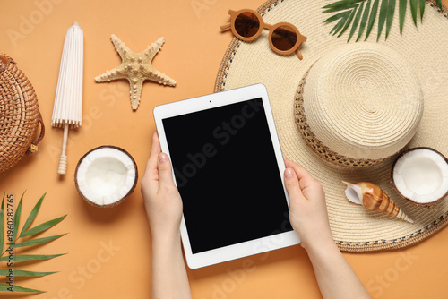 Female hands with tablet co...