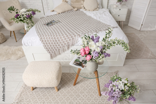 Interior of light bedroom w...