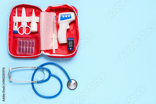 Open first aid kit with ste...