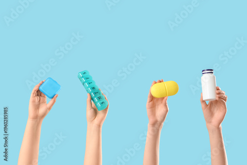 Female hands with jar of me...