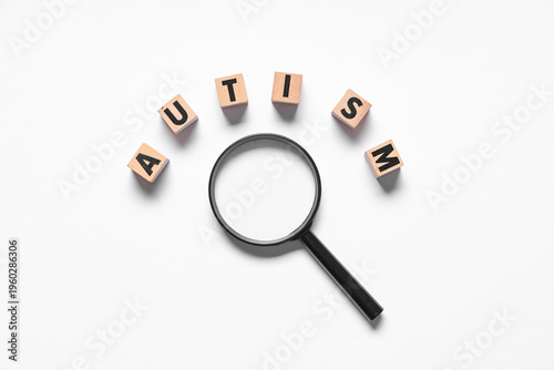 Word AUTISM made of wooden ...