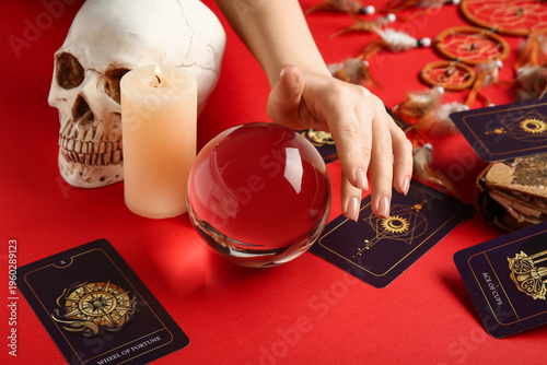 Female hand with tarot card...