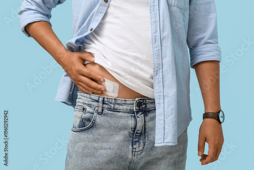 Young man with medical patc...