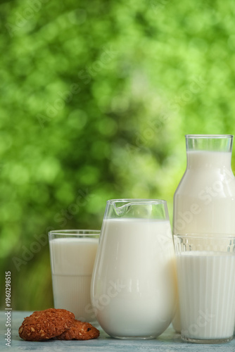 Glasses and jug of fresh mi...