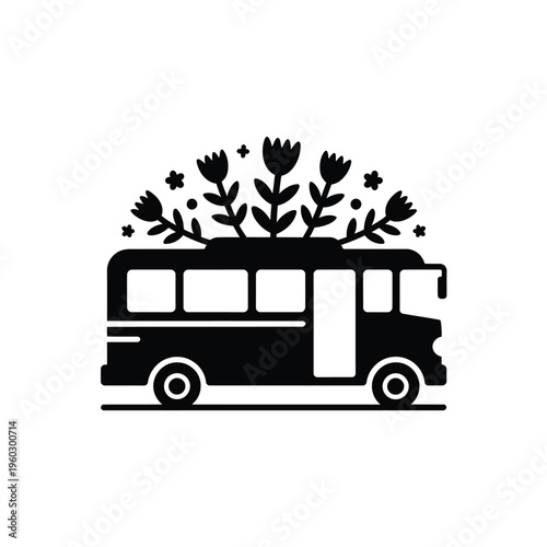 A black silhouette of a vintage camper van adorned with wildflowers