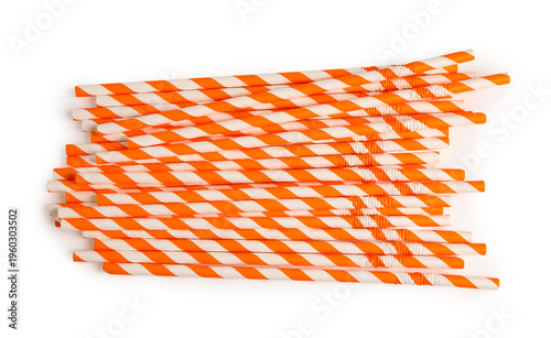 Heap of colorful paper drinking straws isolated on white background