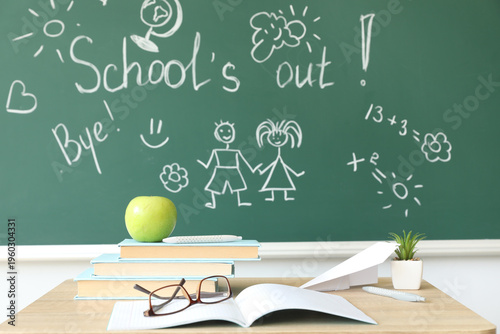 Text SCHOOL'S OUT with draw...