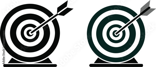 Black and white target with arrow hitting the center symbolizing success and accuracy