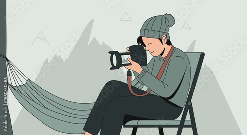 Man Photographing Mountains From Hammock Chair