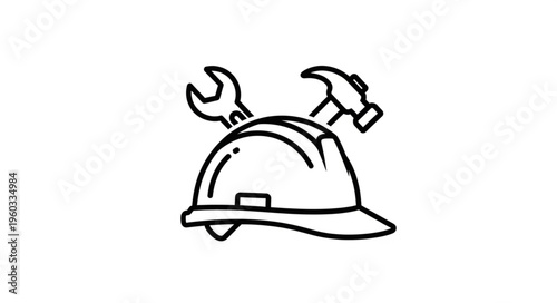 Construction helmet with tools, representing building and repair work, safety first.